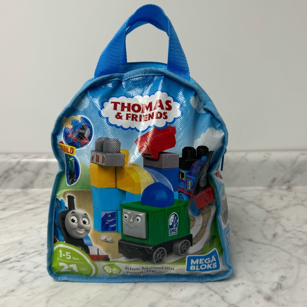 Mixed bag of Thomas and Friends Mega Bloks and Duplo building blocks.